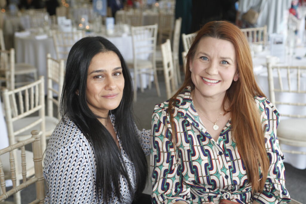 event guests smiling at camera