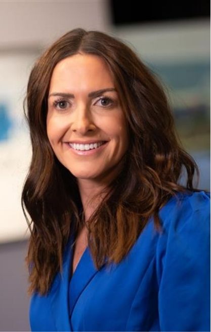 A photo of ITV presenter Kate Lewis smiling