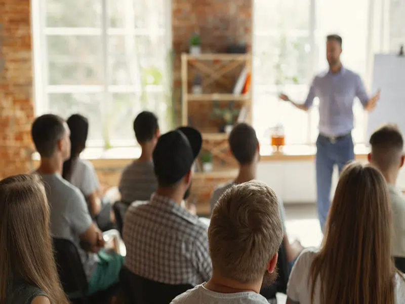 Audience listening to a speaker.